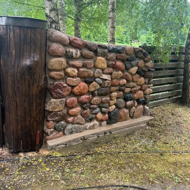 Akmenų tvora po valymo